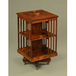 A rosewood inlaid mahogany square revolving bookcase. Height 82 cm, width 47 cm.