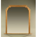 A Victorian gilt framed overmantle mirror, with rounded corners and beaded edge.