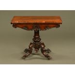 A Victorian rosewood turnover top card table,