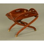 A mahogany butlers style folding tray with stand, reproduction. 67 cm.