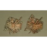 A pair of 18th century gilt bronze appliques, with musical instruments and engraved sheet music,