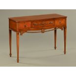 A reproduction mahogany side table,