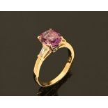 An 18 ct pink sapphire and diamond ring, sapphire +/- 2.8 carats (see illustration).