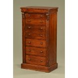 A Victorian oak Wellington chest, of typical form, seven drawers and raised on a plinth base.