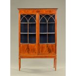 An Edwardian inlaid mahogany display cabinet,