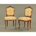 A pair of Victorian walnut side chairs,