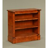 A burr walnut and inlaid inverted breakfront open bookcase, with adjustable shelves and plinth base.