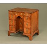 A rare late 17th century walnut kneehole desk of early form, one drawer locked (we have no key).