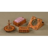 A Tunbridge ware ring tree, a pocket watch stand, matchbox and pin cushion. Matchbox length 6.2 cm.