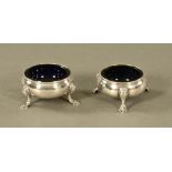 A pair of George III silver salts, London 1761, makers marks rubbed, each with blue glass liner.