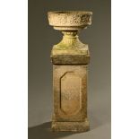 A composition stoneware urn on stand. Height 93 cm, diameter 34 cm.