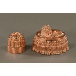 Two 19th century copper jelly moulds, one in the form of a lion and stamped 114,