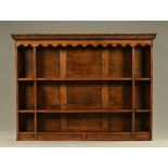 An oak Delft rack, with panelled back and series of open shelves with spice drawers beneath.