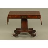 A Regency rosewood brass inlaid sofa table,