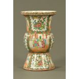 A 19th century Chinese Cantonese spittoon, of baluster form decorated with panels of figures,
