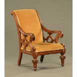 A 19th century early Victorian rosewood library armchair,