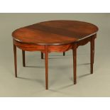 A pair of George III mahogany dining table D ends with single leaf,