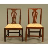 A pair of George III mahogany side chairs,