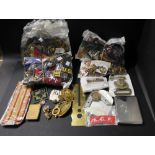 A box of miliaria badges, patches, cigarette case etc.