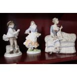 A Royal Worcester figurine Rosie Picking apple, Coalport figurine The Boy,