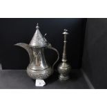 A white metal Dallah (26cm Height) and a white metal rose water vase (19cm Height)