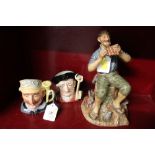 A Royal Doulton Dreamweaver figurine and two Toby jugs the Veteran Motorist and the Gaoler