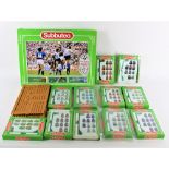 A group of Subbuteo, comprising Fifa World Cup 1990 football game, plastic seating,