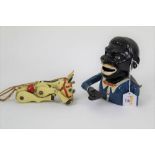 A die cast Lesney Muffin the Mule puppet toy together with a Starkies Patent jolly man money bank