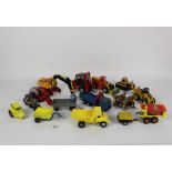 A crate of assorted diecast construction models by Dinky, Conrad, Joal, and Corgi, plus others,