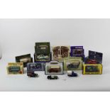 A group of 14 boxed diecast models,