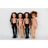 A group of four Kish & Co vinyl dolls, three with brown hair and the other with auburn hair,
