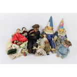 A group of miscellaneous antique and later dolls, to include a cloth fisherman doll,