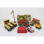 A group of 0 gauge tin plate railway models, to include three brown/cream coaches, a signal,