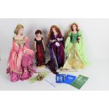 Four Franklin Mint portrait dolls on stands, to comprise an Heirloom Dolls "Cinderella",