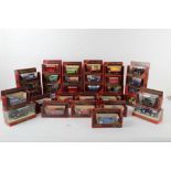 A box of 30 plus Matchbox Models of Yesteryear diecast vehicles in red boxes
