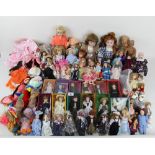 Two boxes of miniature porcelain costume dolls, to include Madame Alexander dolls,