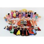 A small quantity of miniature hard plastic costume dolls, mainly versions made in Hong Kong,