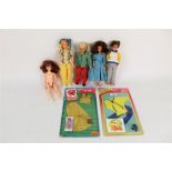A group of vinyl dolls, to include a 1973 Mattel Sunshine Families doll,