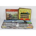 Two Hornby 00 gauge model train sets, to comprise a "Silver Jubilee" R837 train set,