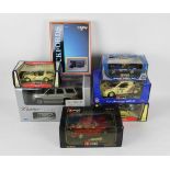 A group of 6 large scale diecast models, by Burago and Anson,