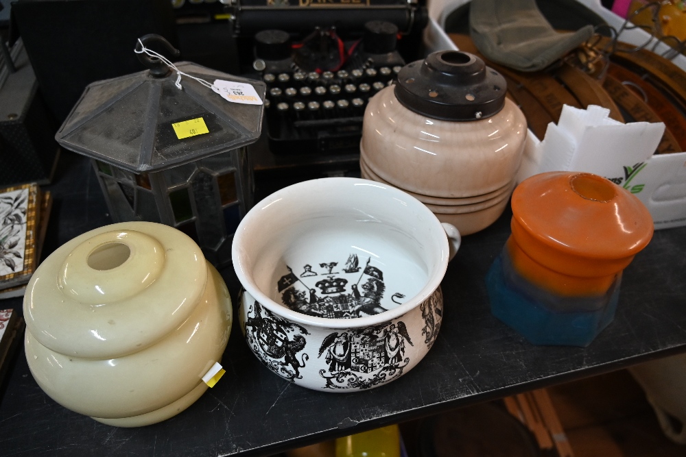 Four glass light shades to include a hanging stained glass light shade and a chamber pot