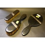 An ebony 3 piece dressing table set with silver band decoration