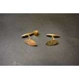 A pair of 9 ct gold engraved cufflinks and button,