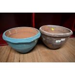 Two circular planters in blue and brown (246)