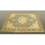 An antique Tabriz carpet,