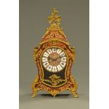 A 19th century style faux boulle marquetry mantle clock, with two train striking movement. Italian.