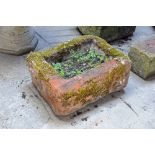 A rectangular sandstone trough. Height 28 cm, width 63 cm, depth 46 cm.