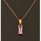 A 9 ct gold amethyst drop pendant and chain.