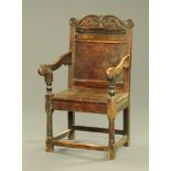 An antique oak Wainscot chair,