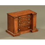 A 19th century mahogany inverted breakfront miniature chest of drawers,